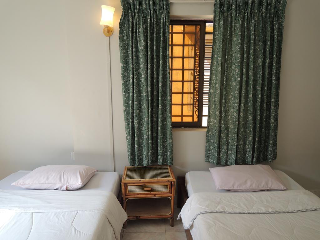The Grey Guesthouse Phnom-Penh Kamer foto